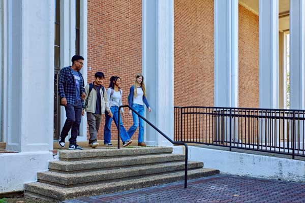 Students walking across MGA's Cochran Campus.
